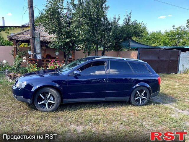 Синий Ауди А4, объемом двигателя 1.6 л и пробегом 320 тыс. км за 4400 $, фото 1 на Automoto.ua