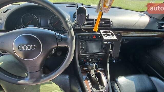 Синий Ауди А4, объемом двигателя 2.5 л и пробегом 236 тыс. км за 4700 $, фото 5 на Automoto.ua