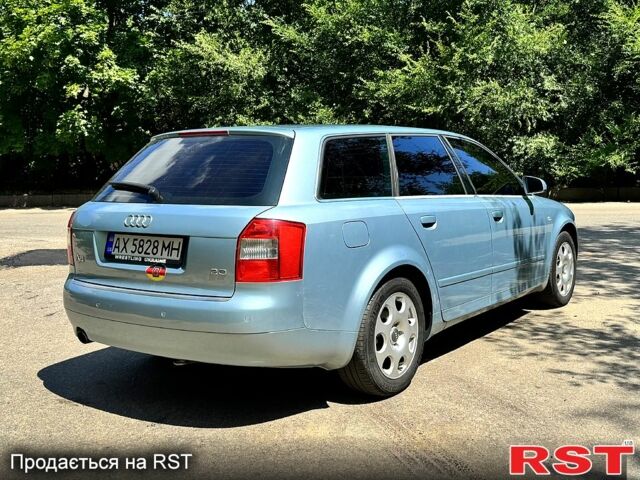 Синий Ауди А4, объемом двигателя 2 л и пробегом 205 тыс. км за 4900 $, фото 4 на Automoto.ua