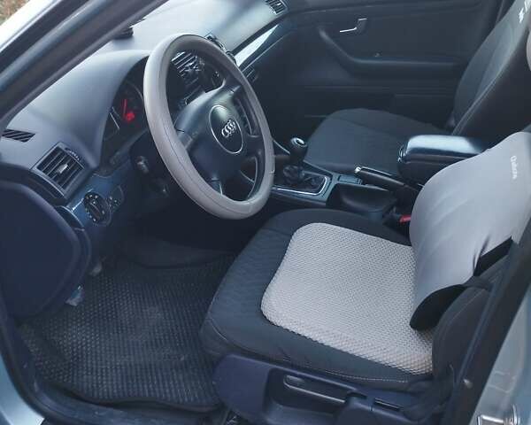 Синий Ауди А4, объемом двигателя 1.6 л и пробегом 318 тыс. км за 4500 $, фото 4 на Automoto.ua