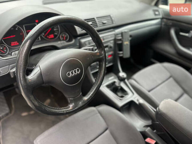 Синий Ауди А4, объемом двигателя 2.5 л и пробегом 294 тыс. км за 5400 $, фото 6 на Automoto.ua