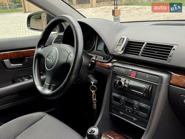 Синий Ауди А4, объемом двигателя 2.5 л и пробегом 335 тыс. км за 5950 $, фото 74 на Automoto.ua