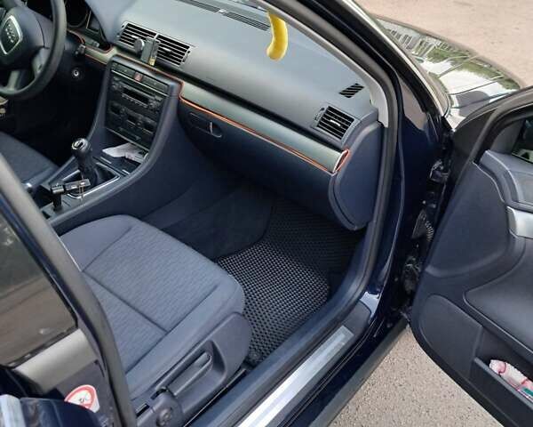 Синій Ауді А4, об'ємом двигуна 2 л та пробігом 233 тис. км за 7500 $, фото 3 на Automoto.ua