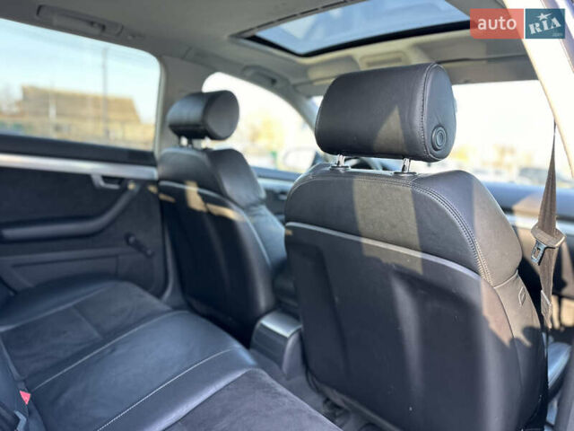 Синий Ауди А4, объемом двигателя 1.8 л и пробегом 266 тыс. км за 7400 $, фото 45 на Automoto.ua