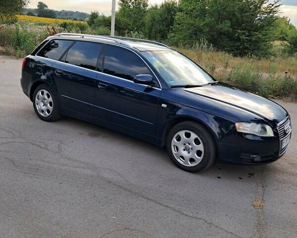 Синій Ауді А4, об'ємом двигуна 2 л та пробігом 233 тис. км за 7500 $, фото 5 на Automoto.ua