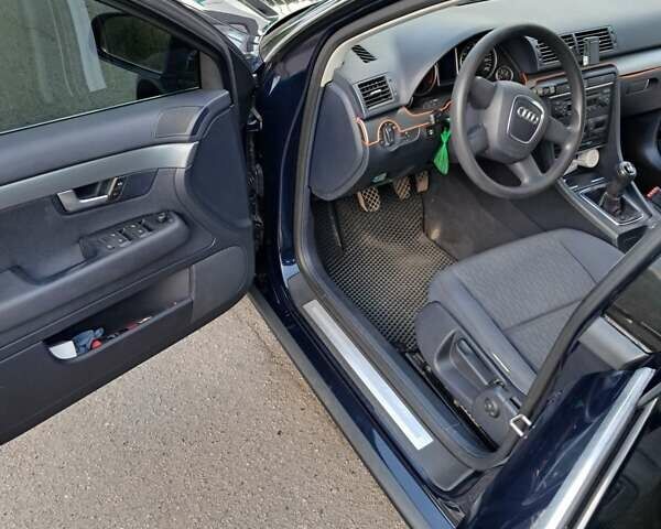 Синій Ауді А4, об'ємом двигуна 2 л та пробігом 233 тис. км за 7500 $, фото 17 на Automoto.ua