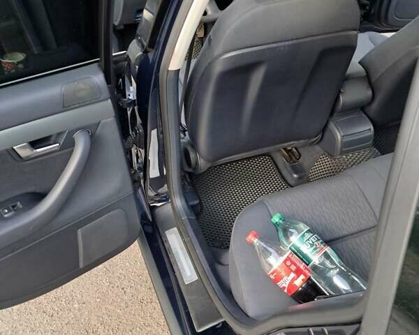 Синій Ауді А4, об'ємом двигуна 2 л та пробігом 233 тис. км за 7500 $, фото 11 на Automoto.ua