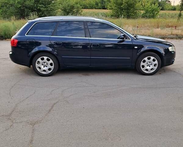 Синій Ауді А4, об'ємом двигуна 2 л та пробігом 233 тис. км за 7500 $, фото 1 на Automoto.ua