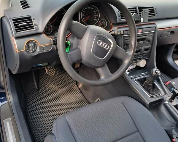 Синий Ауди А4, объемом двигателя 2 л и пробегом 233 тыс. км за 7500 $, фото 13 на Automoto.ua