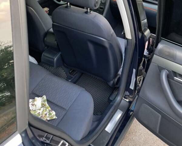 Синій Ауді А4, об'ємом двигуна 2 л та пробігом 233 тис. км за 7500 $, фото 2 на Automoto.ua