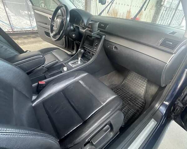 Синій Ауді А4, об'ємом двигуна 2 л та пробігом 253 тис. км за 6490 $, фото 6 на Automoto.ua