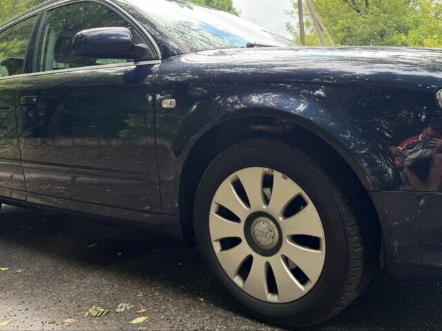 Синій Ауді А4, об'ємом двигуна 2 л та пробігом 298 тис. км за 1751 $, фото 9 на Automoto.ua