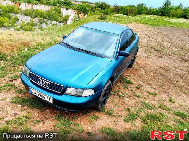 Зеленый Ауди А4, объемом двигателя 1.8 л и пробегом 303 тыс. км за 4100 $, фото 1 на Automoto.ua