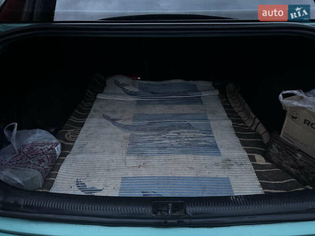 Зеленый Ауди А4, объемом двигателя 1.8 л и пробегом 318 тыс. км за 3400 $, фото 10 на Automoto.ua