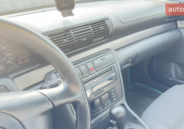 Зеленый Ауди А4, объемом двигателя 1.78 л и пробегом 244 тыс. км за 5500 $, фото 3 на Automoto.ua