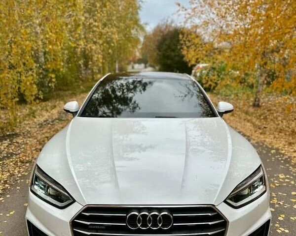 Белый Ауди А5, объемом двигателя 1.98 л и пробегом 190 тыс. км за 21000 $, фото 1 на Automoto.ua