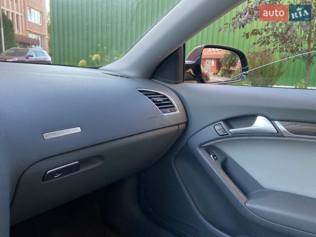 Черный Ауди А5, объемом двигателя 2 л и пробегом 143 тыс. км за 10500 $, фото 98 на Automoto.ua