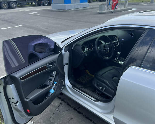 Серый Ауди А5, объемом двигателя 1.97 л и пробегом 222 тыс. км за 16000 $, фото 12 на Automoto.ua