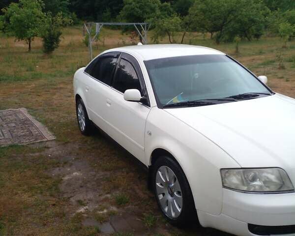 Белый Ауди А6, объемом двигателя 2.39 л и пробегом 312 тыс. км за 4800 $, фото 4 на Automoto.ua