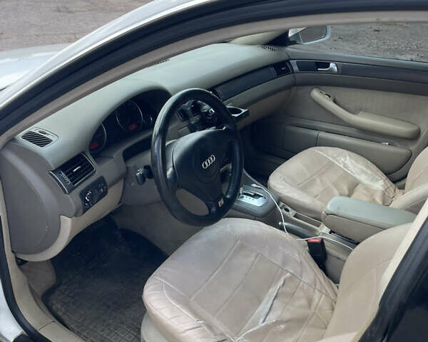 Білий Ауді А6, об'ємом двигуна 2.39 л та пробігом 365 тис. км за 3999 $, фото 7 на Automoto.ua