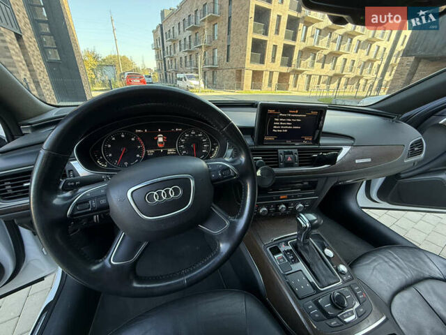 Білий Ауді А6, об'ємом двигуна 1.98 л та пробігом 237 тис. км за 12300 $, фото 14 на Automoto.ua