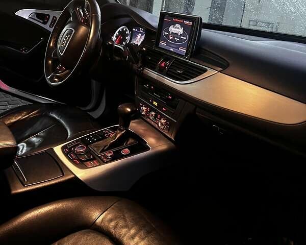 Білий Ауді А6, об'ємом двигуна 1.98 л та пробігом 162 тис. км за 14250 $, фото 16 на Automoto.ua