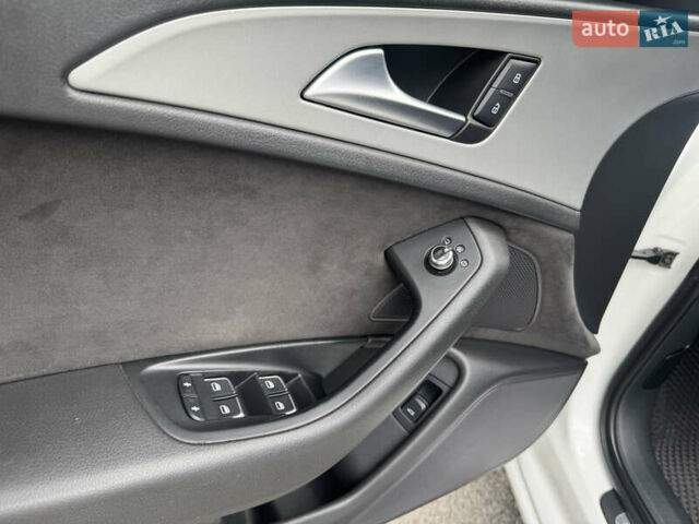 Білий Ауді А6, об'ємом двигуна 2 л та пробігом 212 тис. км за 13599 $, фото 25 на Automoto.ua