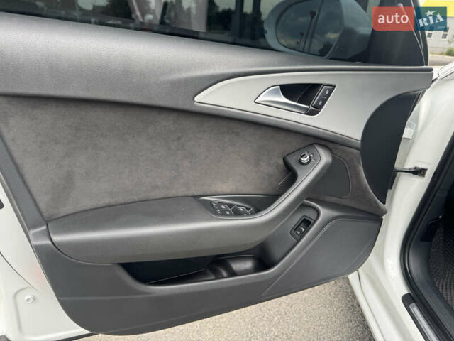 Білий Ауді А6, об'ємом двигуна 2 л та пробігом 212 тис. км за 11799 $, фото 24 на Automoto.ua