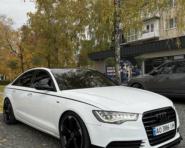Ауді А6 2012 у Виноградове на Automoto.ua Білий Ауді А6, об'ємом двигуна 3 л та пробігом 286 тис. км за 16900 $, фото 12 на Automoto.ua