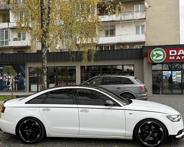 Ауді А6 2012 у Виноградове на Automoto.ua Білий Ауді А6, об'ємом двигуна 3 л та пробігом 286 тис. км за 16900 $, фото 13 на Automoto.ua