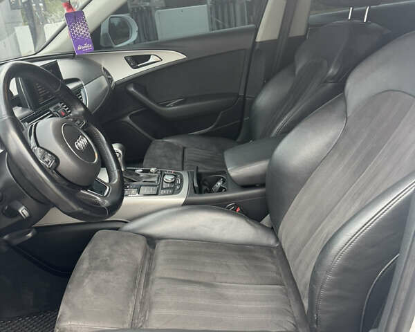 Білий Ауді А6, об'ємом двигуна 2 л та пробігом 212 тис. км за 13599 $, фото 26 на Automoto.ua