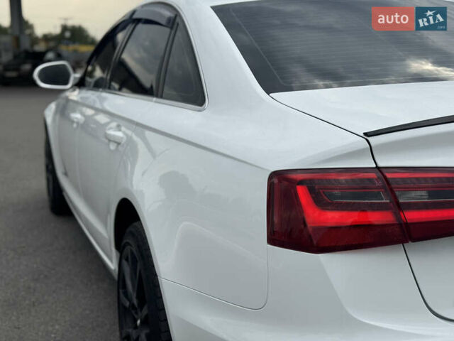 Білий Ауді А6, об'ємом двигуна 2 л та пробігом 212 тис. км за 11799 $, фото 10 на Automoto.ua