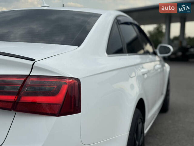 Білий Ауді А6, об'ємом двигуна 2 л та пробігом 212 тис. км за 13599 $, фото 13 на Automoto.ua