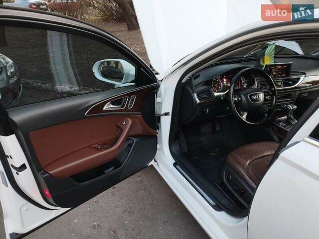 Білий Ауді А6, об'ємом двигуна 1.98 л та пробігом 186 тис. км за 12000 $, фото 12 на Automoto.ua