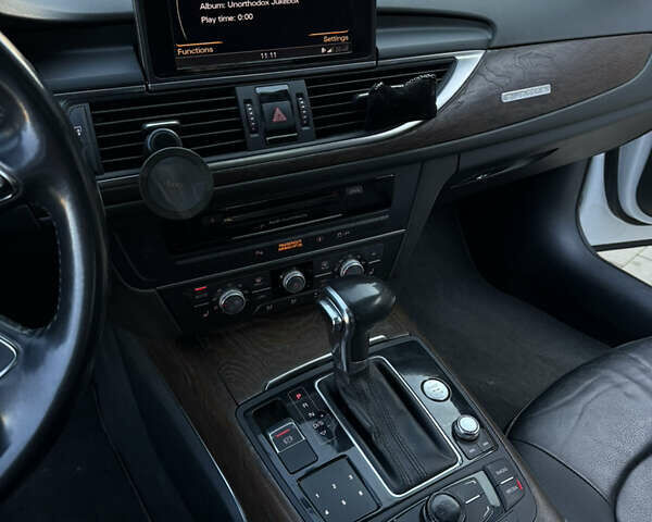 Білий Ауді А6, об'ємом двигуна 1.98 л та пробігом 237 тис. км за 12300 $, фото 16 на Automoto.ua
