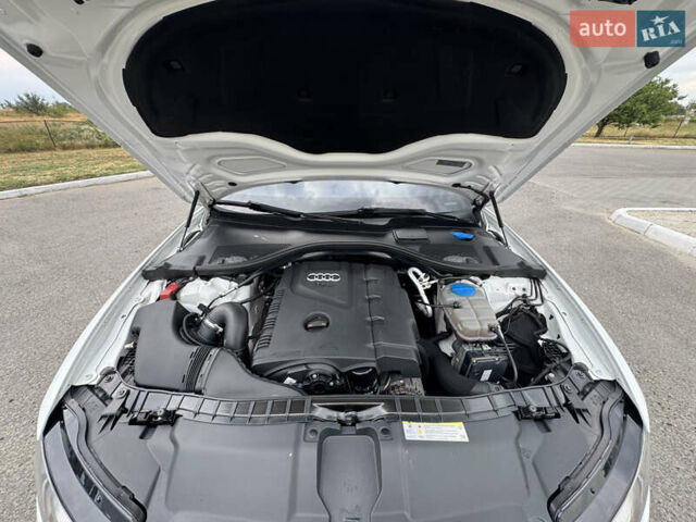 Білий Ауді А6, об'ємом двигуна 2 л та пробігом 212 тис. км за 13599 $, фото 34 на Automoto.ua