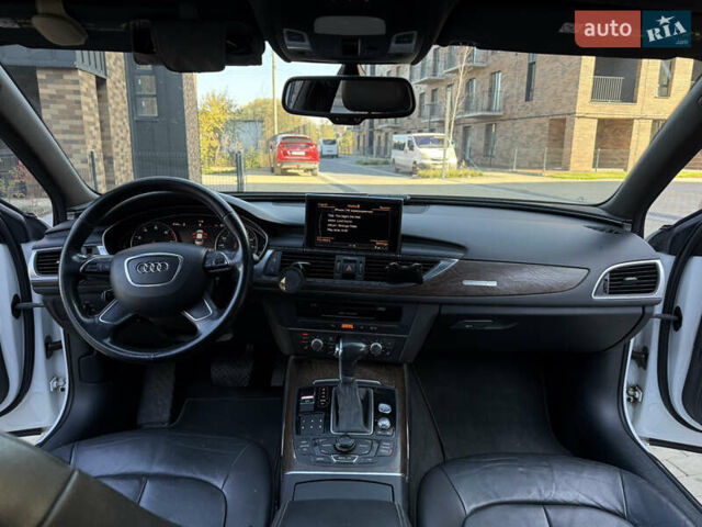 Білий Ауді А6, об'ємом двигуна 1.98 л та пробігом 237 тис. км за 12300 $, фото 22 на Automoto.ua