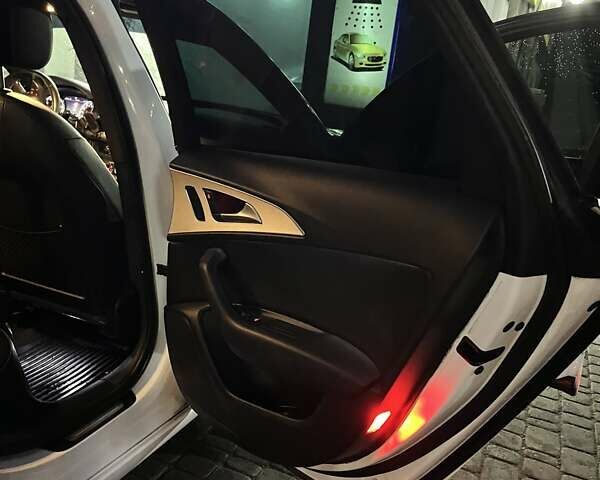 Білий Ауді А6, об'ємом двигуна 1.98 л та пробігом 162 тис. км за 14250 $, фото 1 на Automoto.ua
