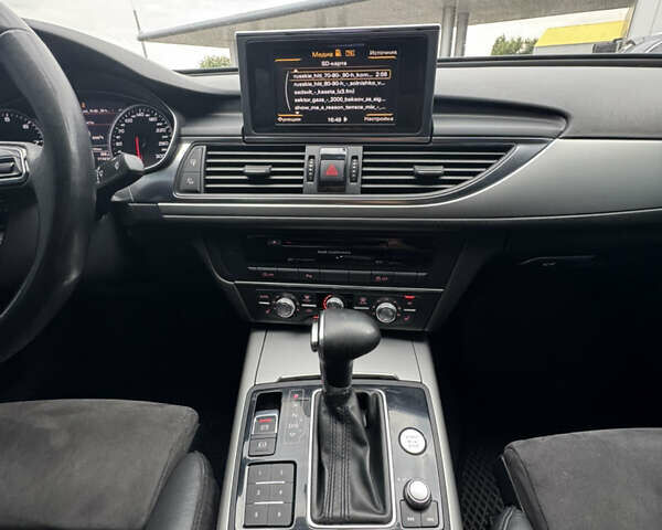Білий Ауді А6, об'ємом двигуна 2 л та пробігом 212 тис. км за 11799 $, фото 28 на Automoto.ua