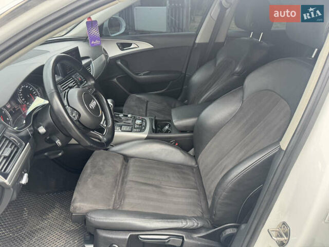 Білий Ауді А6, об'ємом двигуна 2 л та пробігом 212 тис. км за 11799 $, фото 27 на Automoto.ua
