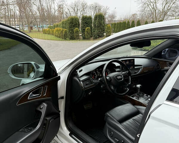 Білий Ауді А6, об'ємом двигуна 2 л та пробігом 233 тис. км за 11700 $, фото 24 на Automoto.ua