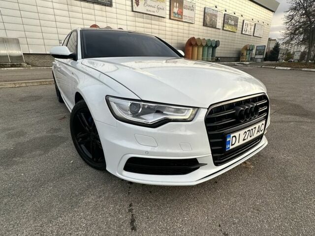 Білий Ауді А6, об'ємом двигуна 2 л та пробігом 198 тис. км за 15950 $, фото 1 на Automoto.ua