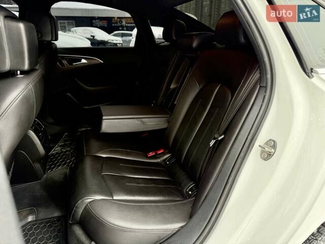 Білий Ауді А6, об'ємом двигуна 1.98 л та пробігом 210 тис. км за 12800 $, фото 10 на Automoto.ua