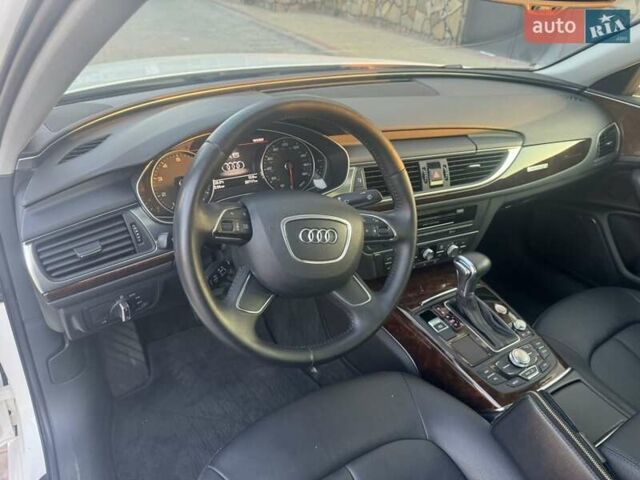 Білий Ауді А6, об'ємом двигуна 1.98 л та пробігом 263 тис. км за 12800 $, фото 4 на Automoto.ua