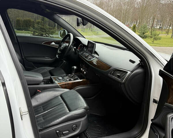 Білий Ауді А6, об'ємом двигуна 2 л та пробігом 233 тис. км за 11700 $, фото 25 на Automoto.ua