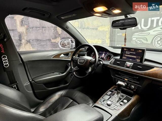 Білий Ауді А6, об'ємом двигуна 1.98 л та пробігом 210 тис. км за 12800 $, фото 13 на Automoto.ua