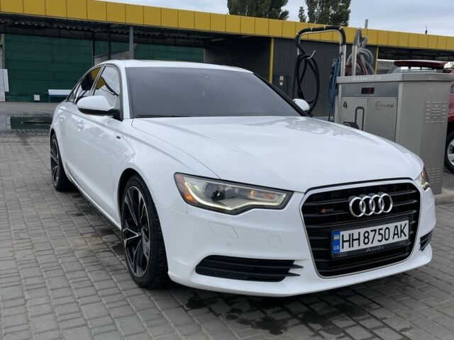 Белый Ауди А6, объемом двигателя 2 л и пробегом 169 тыс. км за 13998 $, фото 2 на Automoto.ua