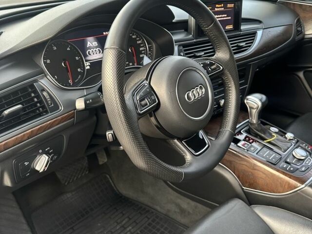 Білий Ауді А6, об'ємом двигуна 2 л та пробігом 198 тис. км за 15950 $, фото 12 на Automoto.ua