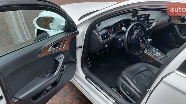 Білий Ауді А6, об'ємом двигуна 1.98 л та пробігом 183 тис. км за 16000 $, фото 14 на Automoto.ua