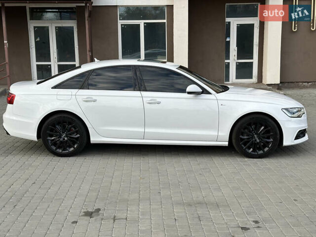 Белый Ауди А6, объемом двигателя 2.97 л и пробегом 126 тыс. км за 21000 $, фото 1 на Automoto.ua